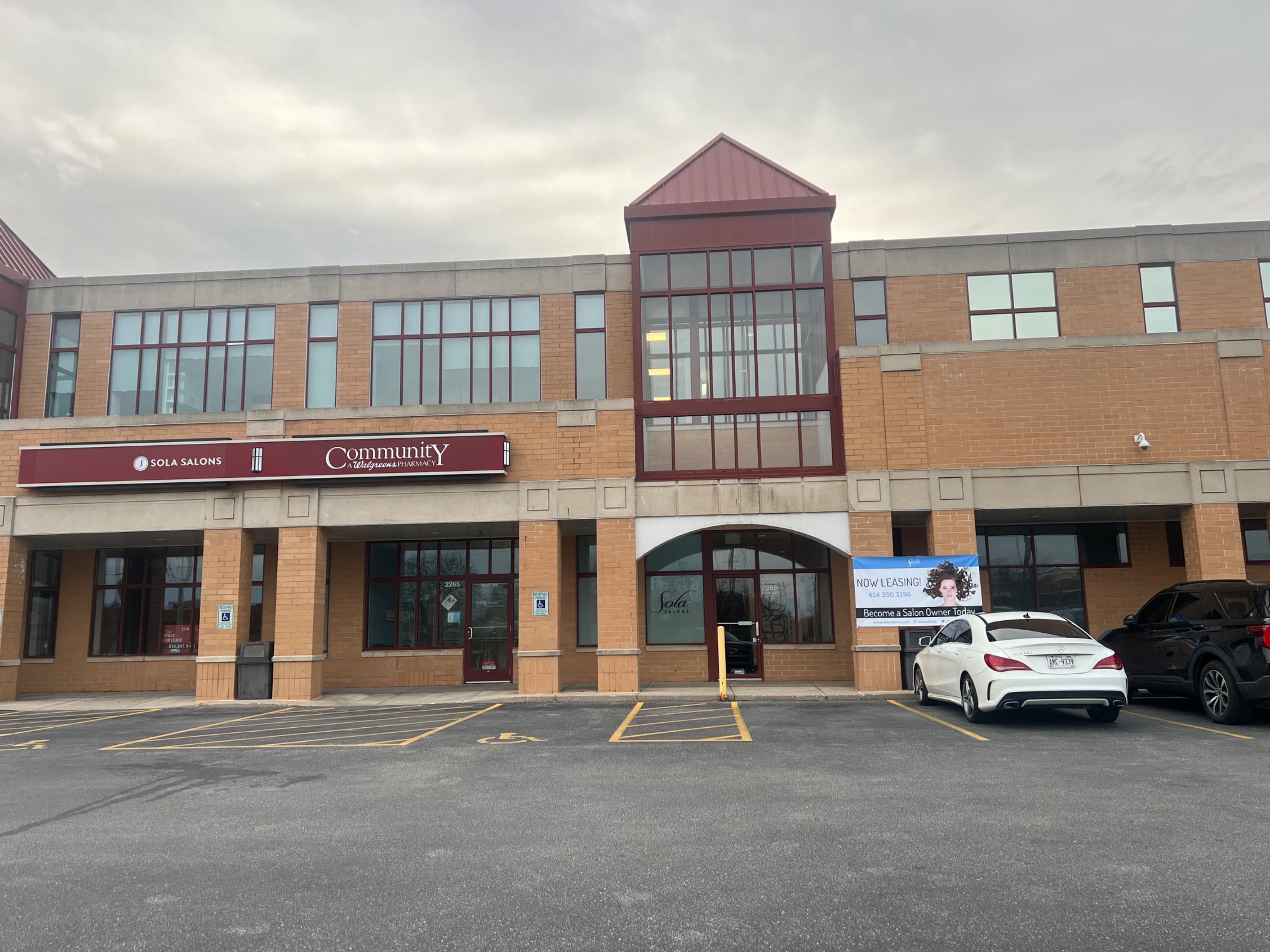 Quez Creations/Sola Salon Suites